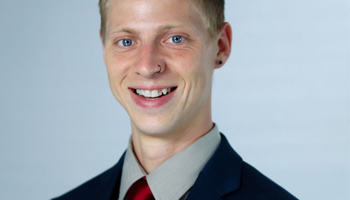 Timothy-Freeman-Headshot-Featured-min